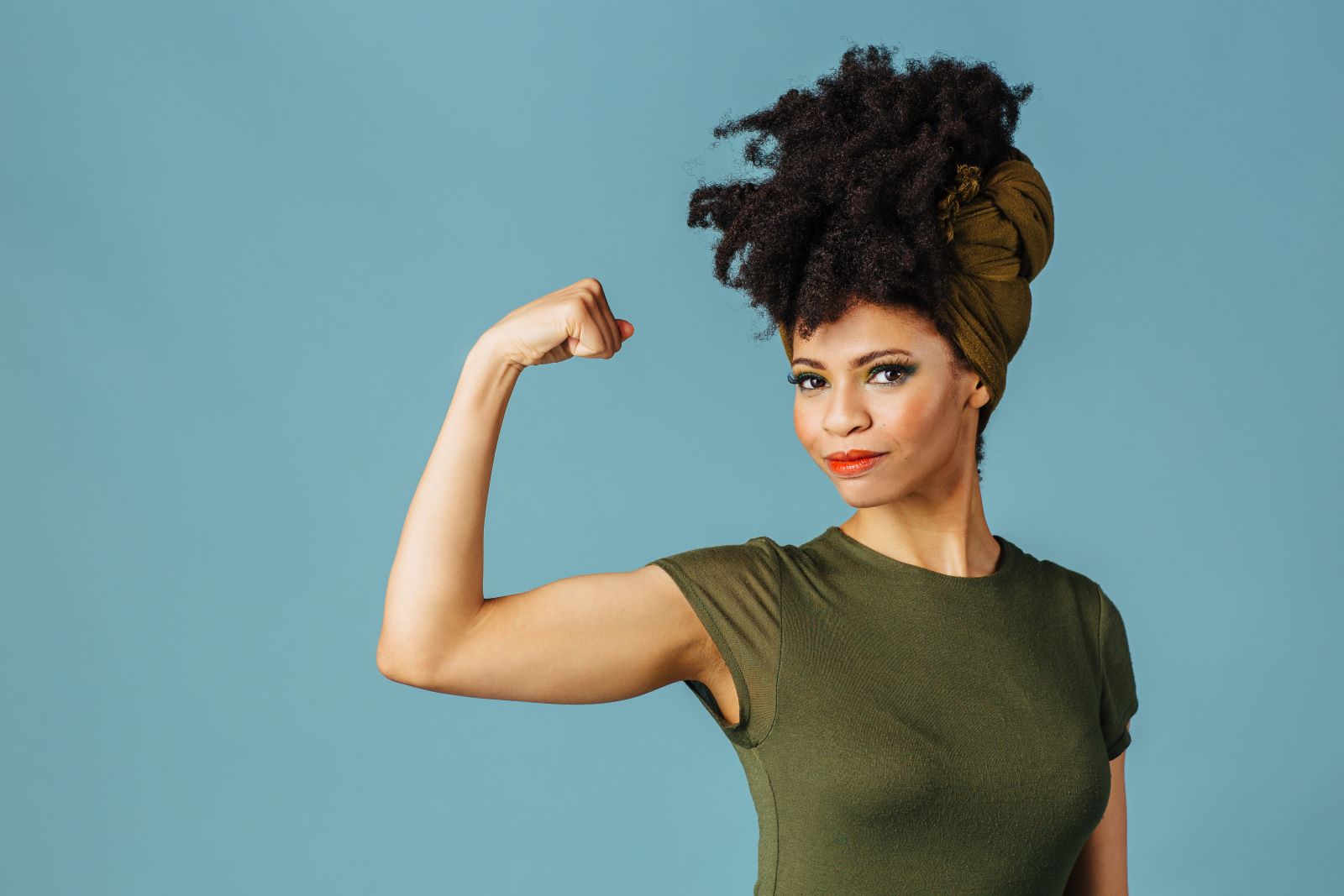 Woman flexing her bicep