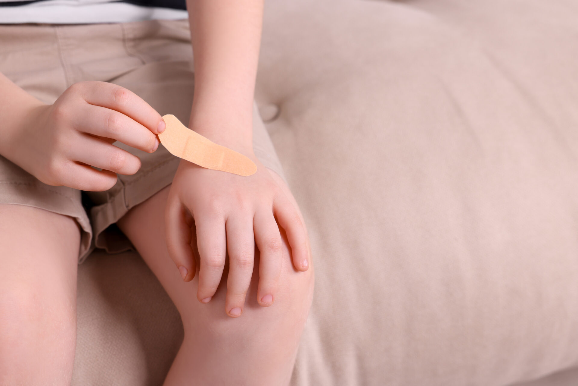 Bandaid on child's hand - temporary fix